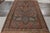 Hand knotted in wool, a rare antique dragon Soumak rug originating from Russia circa 1920-1930, relishing a union of a...
