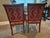 Pair of french style dining or game table chairs with tapestry upholstery. Curved back, curved arms wood arms and cabriole...