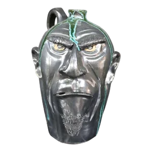 Whimsical Terra-Cotta Face Jug