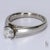 This is a platinum cathedral style ring with a 5.43mm Round SI2/F Diamond Weighing ~0.5ctw Ring Size - 5.75 Total Weight -...