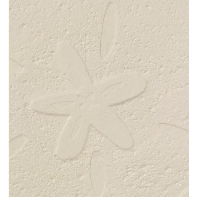 1970s embossed etching on heavy paper of a sand dollar. Titled and signed "M. Line" in pencil under plate mark.