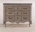 French Louis XV style painted commode C 1945, the block front case has canted sides and three drawers, each dovetailed and...