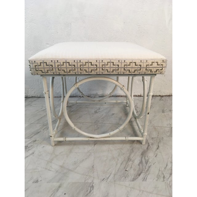 The base to this ottoman is vintage, from the 60’s. We custom designed a removable top with a fabulous textured white...