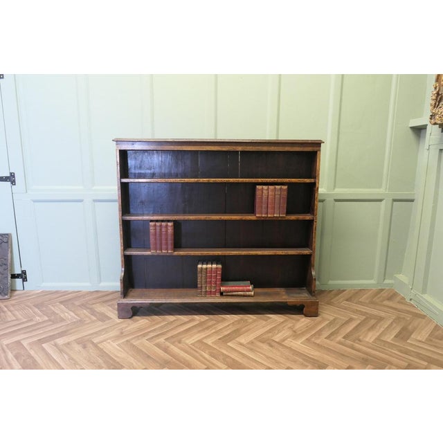 Carved Elm Open Bookcase. The bookcase is good quality, with attractive carving on the front It is in good original...