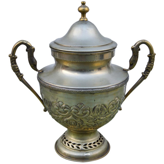 Vintage handmade solid brass urn with lid and handles. Features ornate Moorish engravings and intricate details. No...