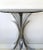 An elegant "gerbe" console table designed and made by Maria Pergay, France, circa 1970s. It was crafted with chrome-plated...