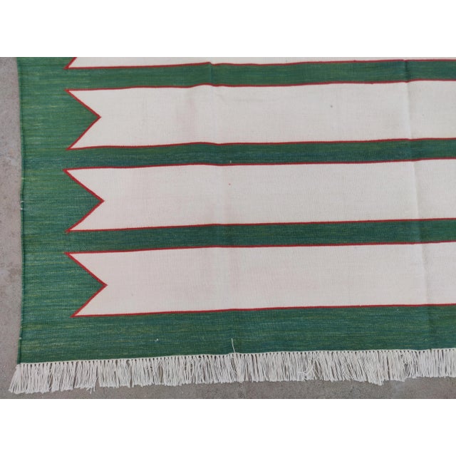 Textile Handmade Green and Red Geometric Border and Cream Fringe Cotton Rug For Sale - Image 7 of 11