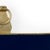 Navy enamel wall frame trimmed in textured gold, holds 4 x 6 photo. 15.3h x 8.8w x .8d