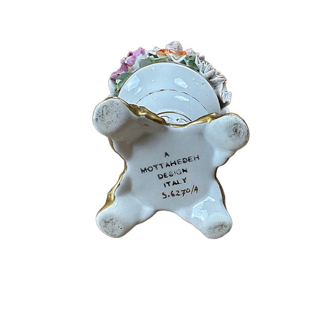 This is a petite porcelain Mottahedeh floral topiary produced in Italy. This is a charming delicately molded floral...
