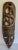 Here is a fantastic hand-carved tribal mask made to hang on a wall. The piece features a mask/face on the bottom with an...