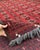 Afghan Turkmen Tekke Bokhara Hand-Knotted Wool Rug, Red Gul, 9'2" X 6'6" For Sale - Image 9 of 13