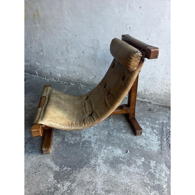 Exceptional Brazilian brutalist easy chair from the 1960s, crafted in solid tropical hardwood (ipe wood) with thick...