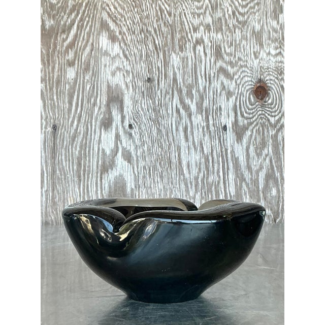 Add a touch of sculptural drama to your space with this signed vintage black art glass bowl by R. Benedetti. Featuring an...