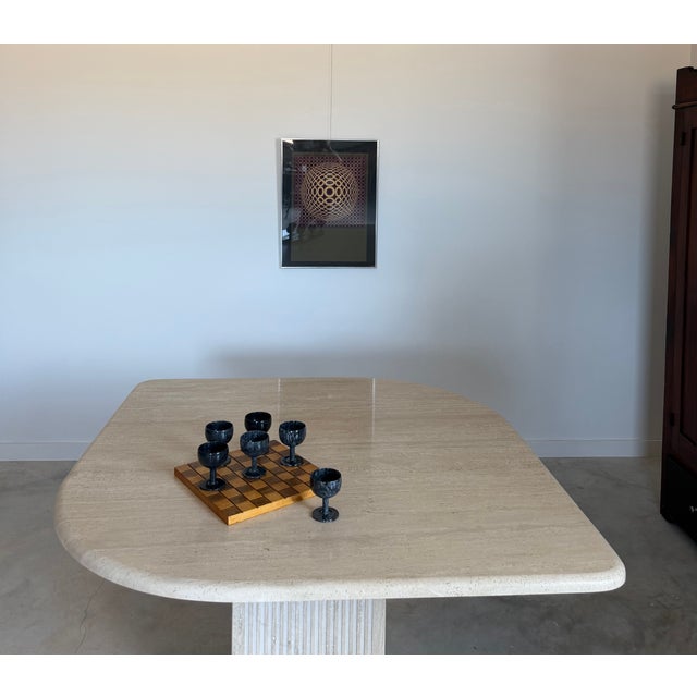 A handmade, hardwood chess/checkerboard re-imagined as a display base/tray for new, old stock carved marble stemware. This...