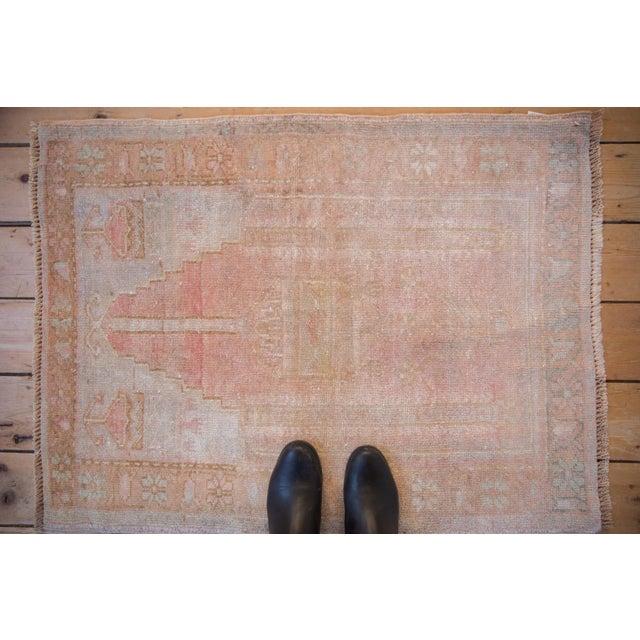 :: Unidirectional prayer design with lantern hanging from the top center mehrab, wrapped by a floral cross-section main...