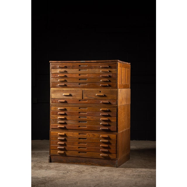 This industrial flat file developed by Hamilton features four sturdy wooden sections each containing five drawers each....