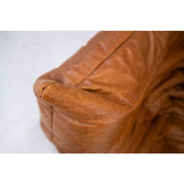 This Togo has been reupholstered with new foam and high-quality new fabric, keeping its inner structure, giving the item...