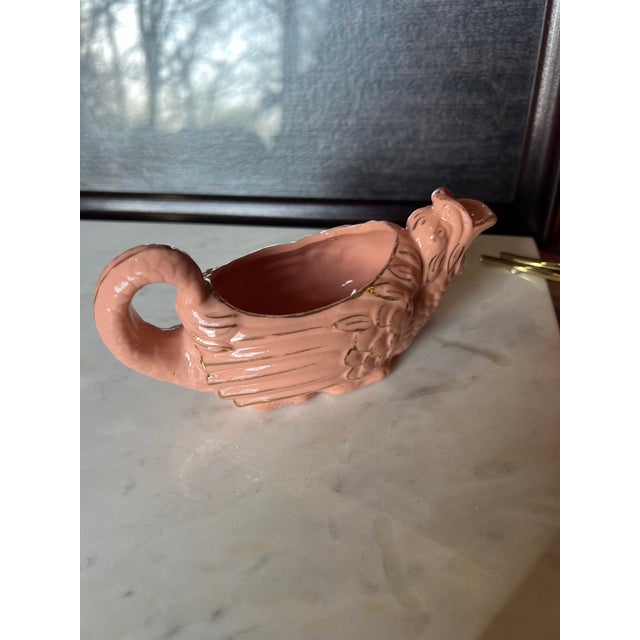 Up for consideration is a beautiful pink ceramic gravy boat. This would look lovely in your home and it is a great find...