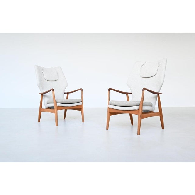 This beautiful shaped pair of kirsten lounge chairs was designed by a. Madsen and h. Schubell and produced by bovenkamp,...