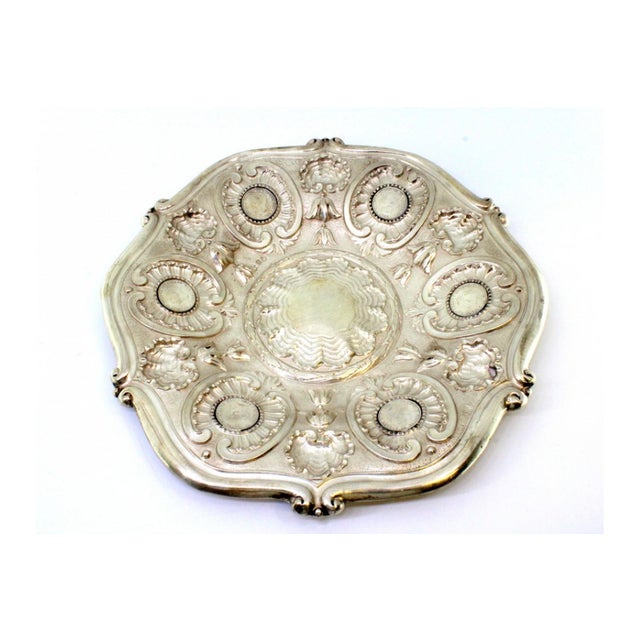 Silver Wall Tray with Shells and Engraved Floral Motifs, in Very Good conditions. Designed 1890 to 1919 This piece has an...