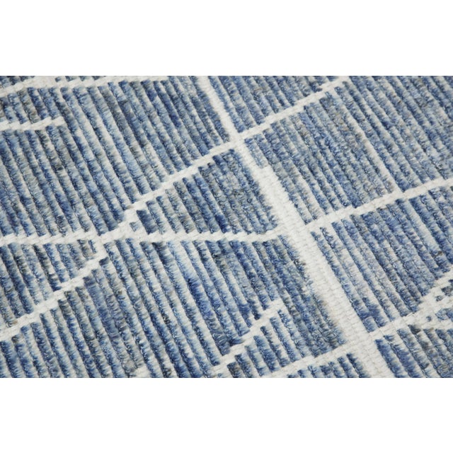 A stunning modern Turkish tulu rug that is sure to add a touch of warmth and luxury to any space. This rug has been...