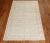A mid 20th Century handknotted light green and ivory worn turkish rug. This piece is a true vintage one of a kind rug that...