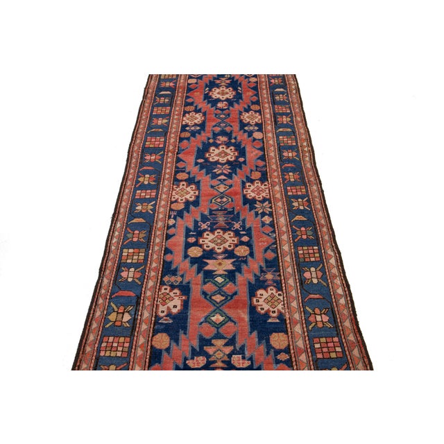 This handcrafted Karabaugh wool runner adds an antique touch to your decor. The perfect accent piece features a rich navy...