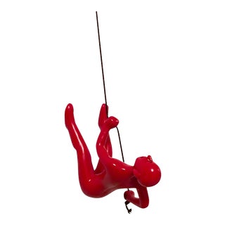 Red Climbing Man Wall Art For Sale