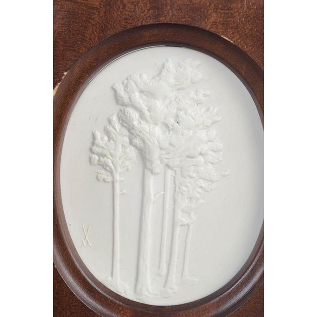 Meissen Biscuit plaque, c. 1970s. Relief plaque in white biscuit porcelain with a stylised nature motif depicting trees,...