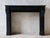 Sleek antique black marble mantel piece, Modillion model, from the early 20th century. Dutch, Amsterdam style fireplace,...