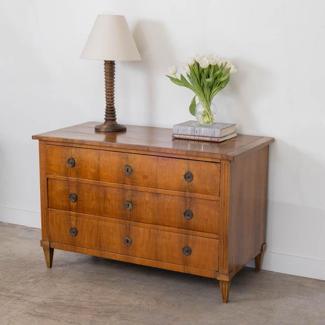 Beautiful carved oak three drawer dresser from France, 1940s. Lovely original brass hardware on front drawers. Each drawer...