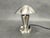Elegant Bauhaus table lamp from 1930s Czechoslovakia, characterized by its clean lines and functional design. Crafted from...
