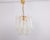 A stunning murano glass petals chandelier in style of mazzega, italy, manufactured in the 1980s. The chandelier is...