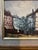 Absolutely beautiful antique painting of a European street scene, matted, framed and ready-to-hang. Wear consistent with...