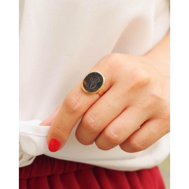 Bloodstone signet ring in 18 karat rose gold. Antique ring centered with a bloodstone plaque, of a beautiful spinach...