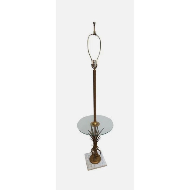 Great shape, tight and sturdy. Light wear. There is some minor paint wear and a small chip on the marble base....