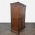 Armoire cabinet with storage for 30 wine bottles, glassware, glass shelf, and additional wood shelves. Brand: Howard...