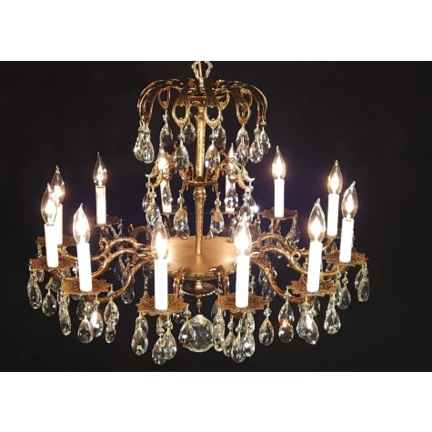HUGE Vintage French Brass 12 Arm 12 Lite Cut Lead Crystal Chandelier. This amazing Chandelier measures 27" Inches wide by...