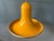 Rare yellow mid century space age pendant lamp in ufo or hat shape. The lamp is made out of metal and has a glossy yellow...