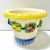 A vibrant Italian majolica cachepot featuring a sculpted fruit garland and richly glazed colors. This cheerful planter...
