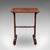 This is an antique side table. An English, rosewood morning room table, dating to the Regency period, circa 1820....