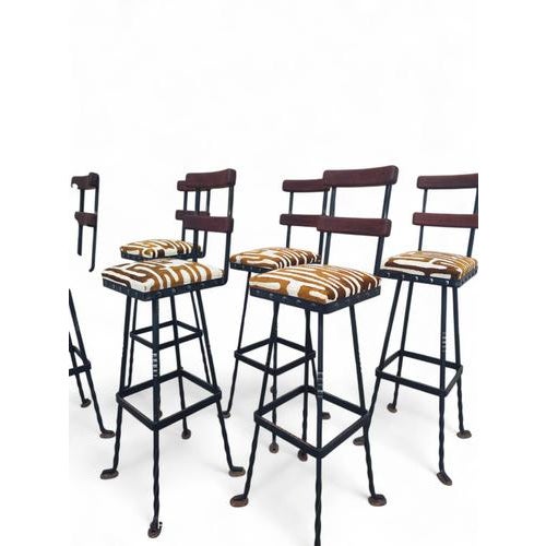 Specifications Step into the bold elegance of the 1970s with this stunning set of six brutalist bar stools. Crafted with a...