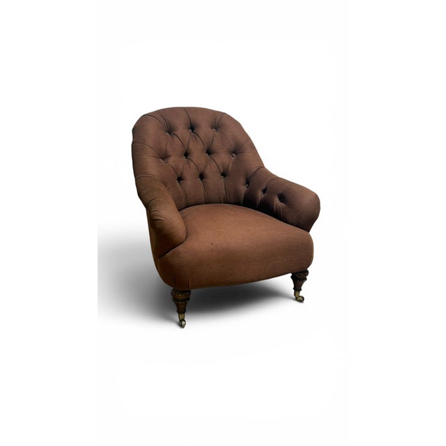 Authentic Ralph Lauren tufted lounge chair on casters and brown fabric. Extremely comfortable. Signed, early 2000s.