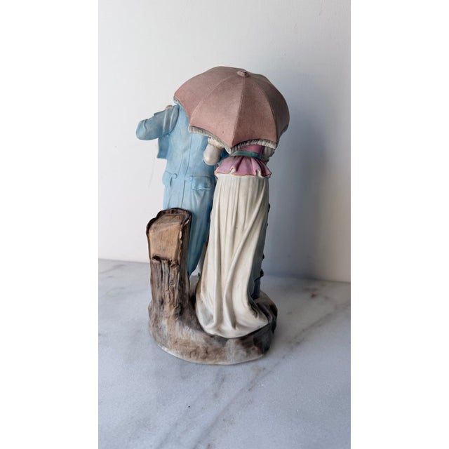 18th-Century Courting Couple Sharing a Parasol Under Pastel-Colored Period Attire. Glazed and Matte Porcelain Figurine For Sale - Image 14 of 15