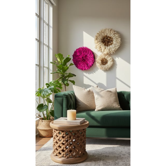 The Bamileke coffee table, hand-carved from a single piece of wood, embodies the exceptional craftsmanship of the Bamileke...