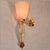 Pair of mid-century modern Murano glass wall sconces, Italy circa 1990s. The pair of Italian sconces is made of pale pink,...