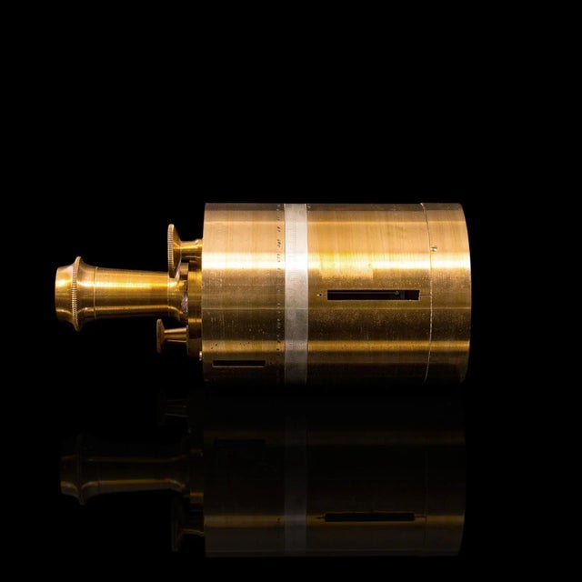 This is an antique vineyard setter's compass. A French, brass surveyor's instrument with mahogany case and stand, dating...