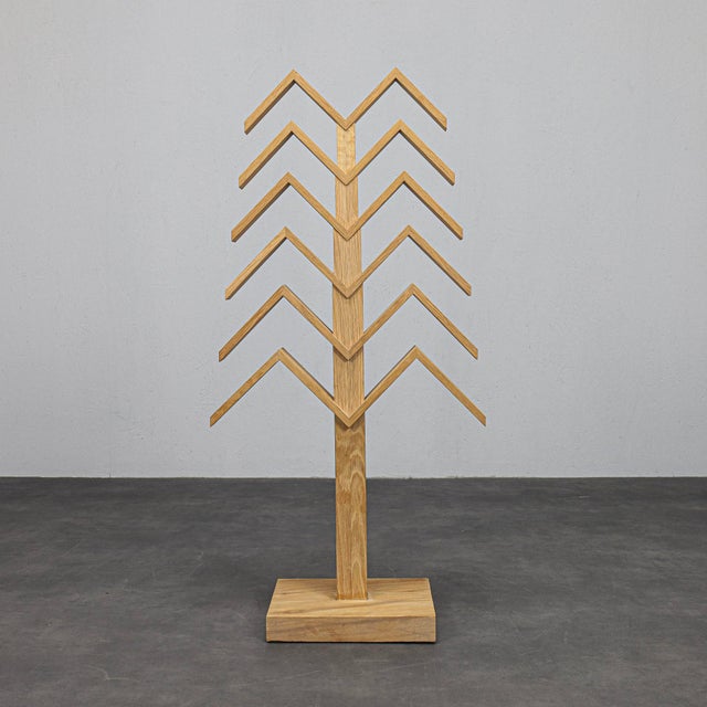 This geometric abstract sculpture by herma steur is executed in solid oak and defined by clarity, rhythm and structural...