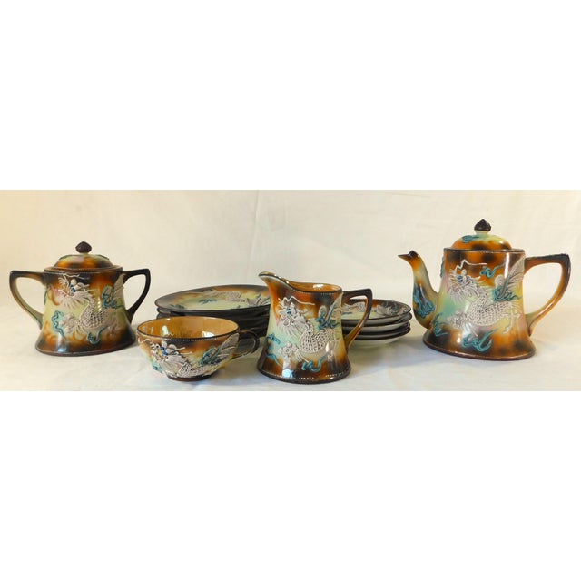 Beautiful mid-century Japanese moriage dragonware porcelain tea set. Very ornate enamel dragon design. Made in Japan....