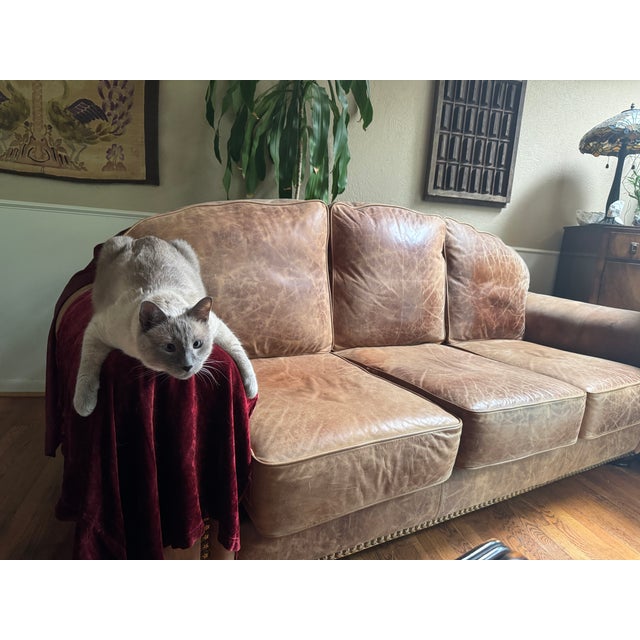 Beautiful oversized handmade leather sofa with incredible patina and character. Rich tobacco/cognac distressed leather...